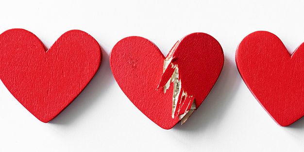 Closeup of red hearts on white background