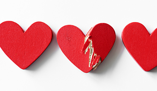 Closeup of red hearts on white background