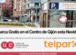 Acceso al parking de Jardines del Náutico en Gijón con logos de Telpark y la Unión de Comerciantes, campaña de aparcamiento gratuito por comprar en las tiendas del Centro.