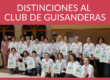 Foto de grupo del acto de entrega de distinciones al Club de Guisanderas celebrado en la Escuela de Hostelería de Gijón